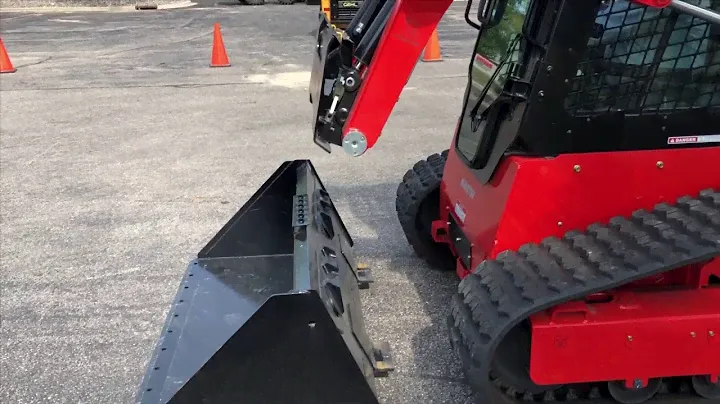 Quick Attach bucket attachment on a new Manitou compact track loader